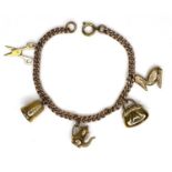 A 9ct gold charm bracelet, with five 9ct gold charms, formed as a pair of scissors, a thimble, a