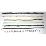 A group of six beaded necklaces, comprising two freshwater pearl seven stranded chokers, one with