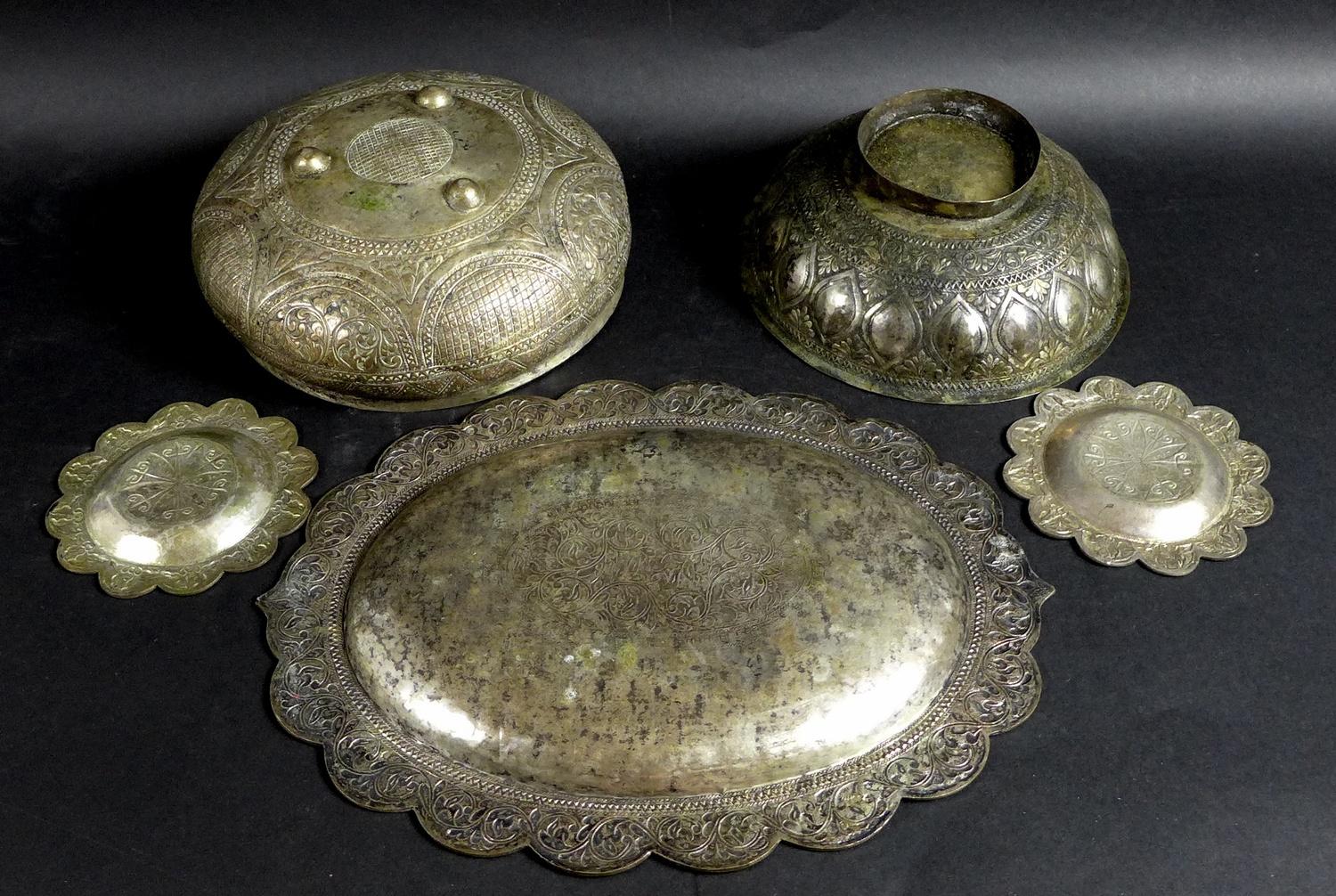 A group of South East Asian white metal items, comprising an oval tray, 33.5 by 25.5cm, a pair of - Image 2 of 2