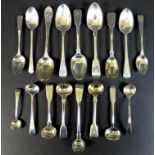 A collection of seventeen Georgian and later silver condiment and teaspoons, including a teaspoon by