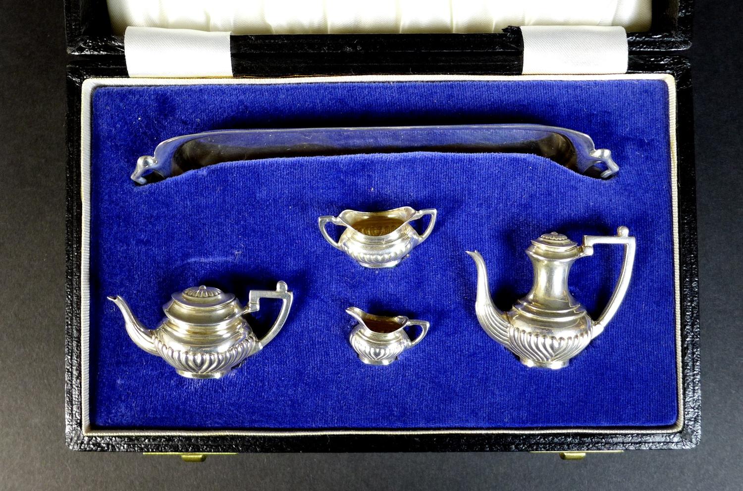 An Elizabeth II silver miniature tea and coffee service, comprising a teapot with lid, 5.3 by 2.2 by - Image 13 of 14