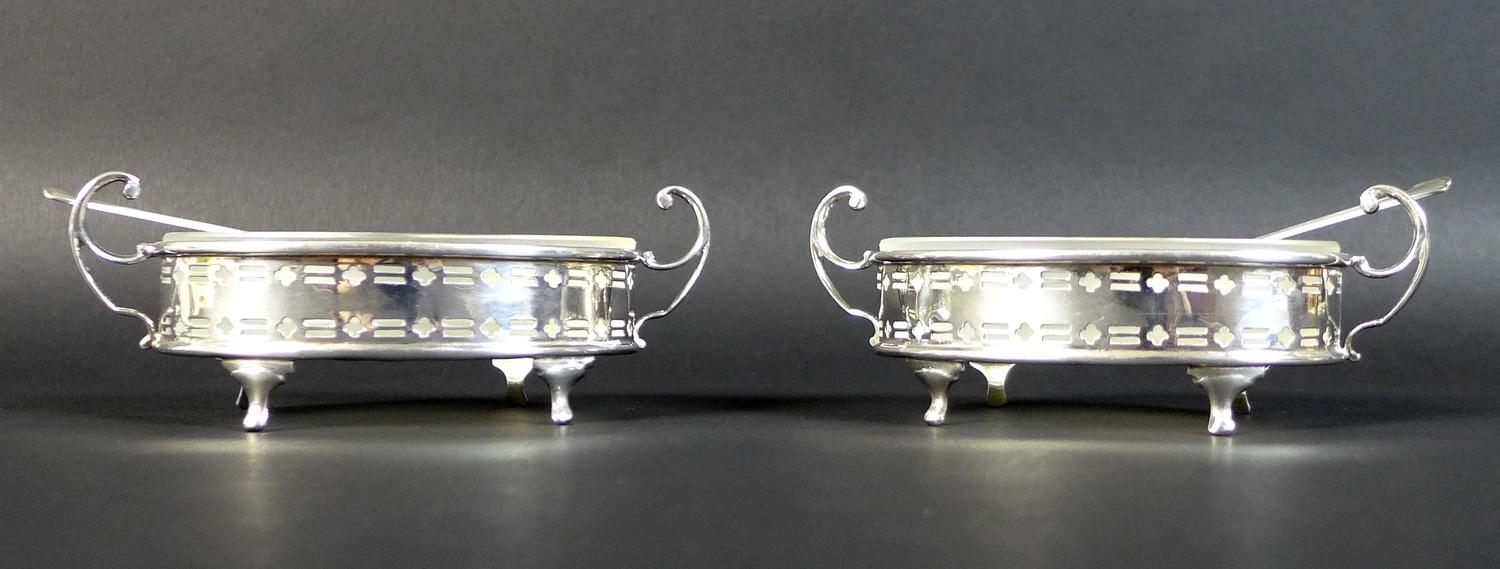 A pair of Elizabeth II silver butter dishes with matching butter knives, of oval form with with twin - Image 2 of 13