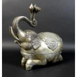 A Cambodian Khmer silver zoomorphic box, in the form of an elephant holding lotus blossom, with Tola