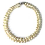 A 19th century double strand of cultured pearls, comprising a strand of forty-two graduated