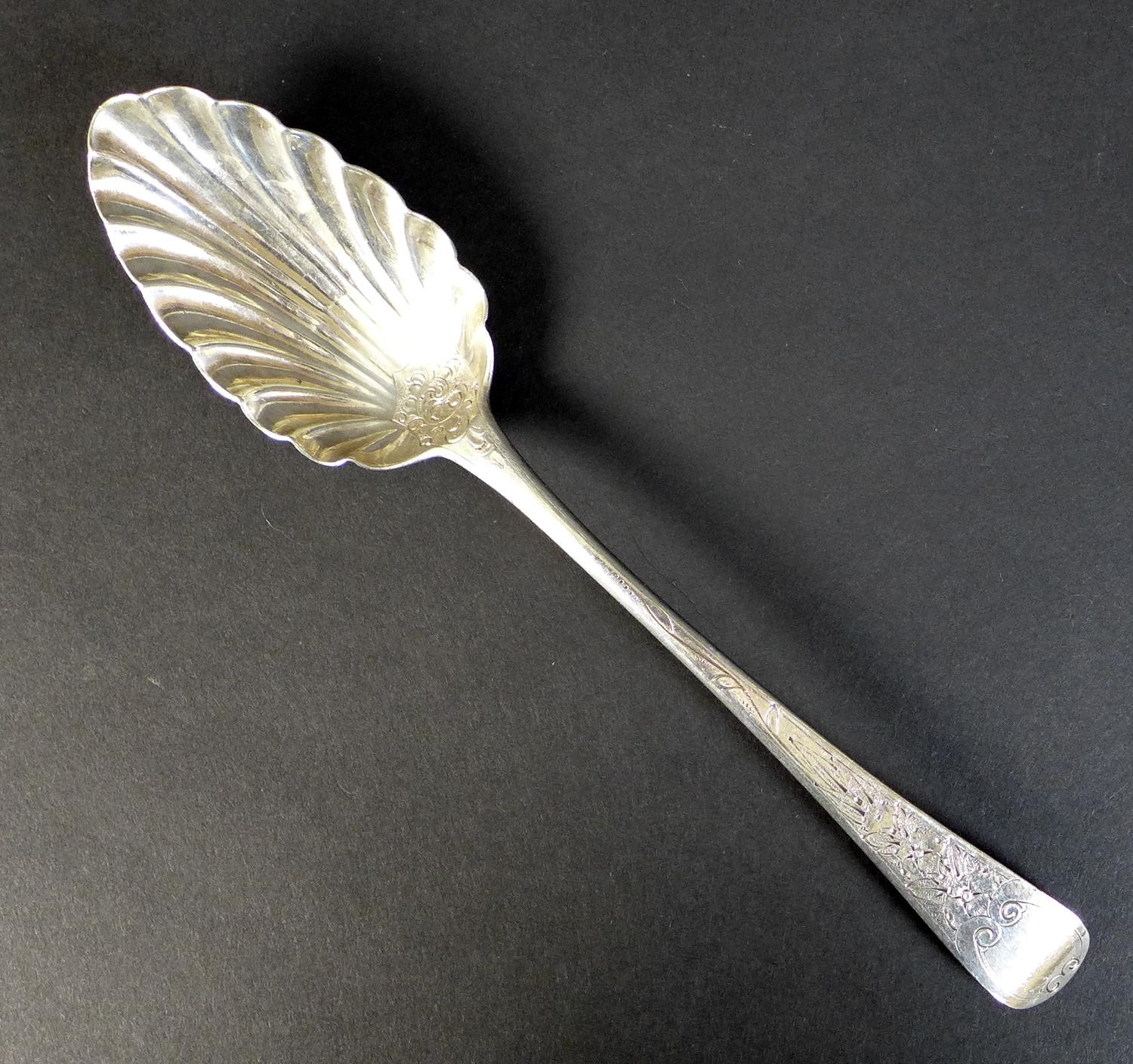 A George III silver serving spoon, with scalloped bowl and engraved decoration to handle, - Image 2 of 6