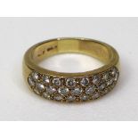 A 9ct gold and diamond ring, set with twenty five brilliant cut diamonds, approximately 0.25ct total