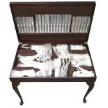 A modern mahogany canteen on stand of silver plated cutlery, Kings pattern, twelve place settings,
