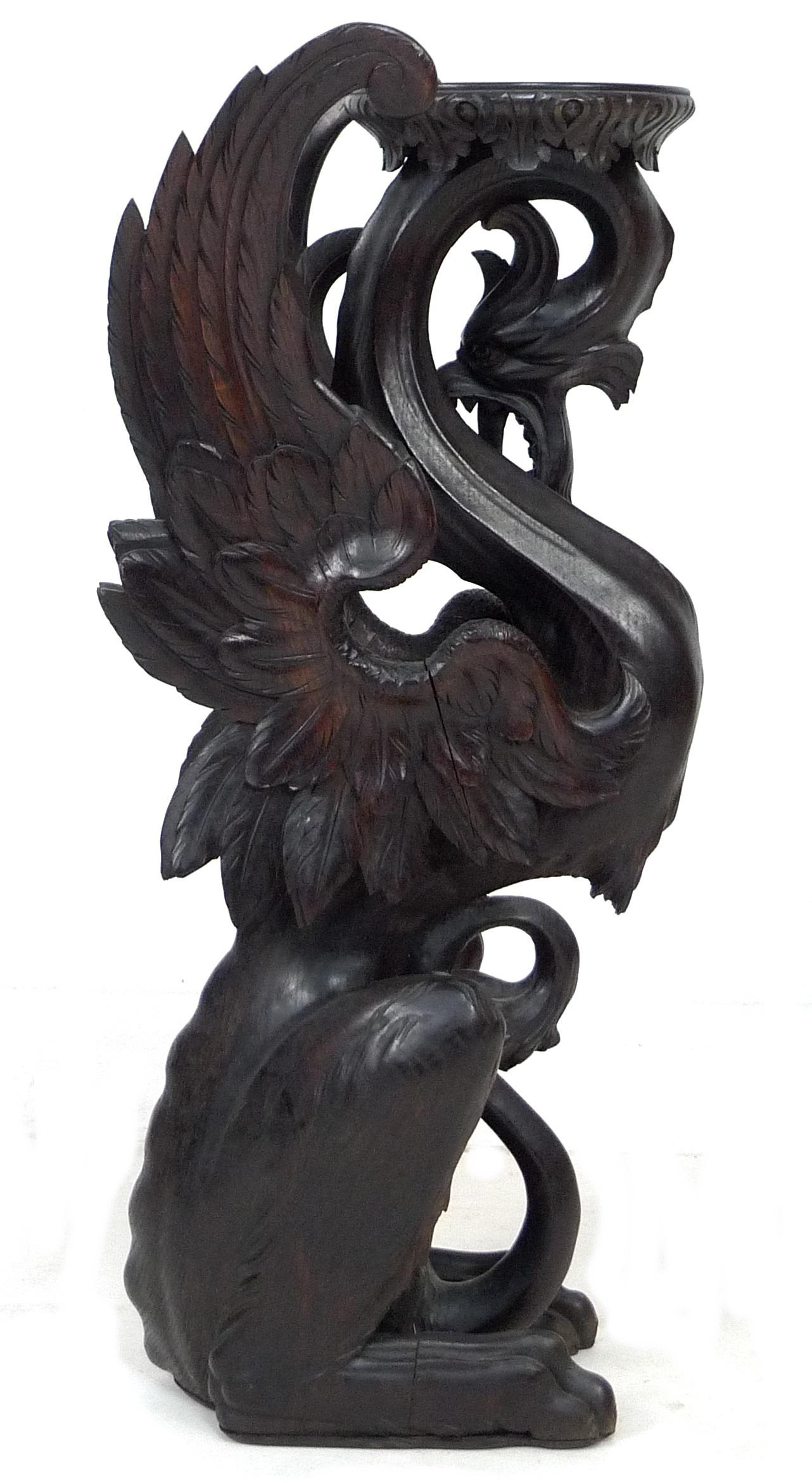 A Continental 19th century finely carved oak Pixiu style form jardiniere stand, with its shaped - Image 4 of 6