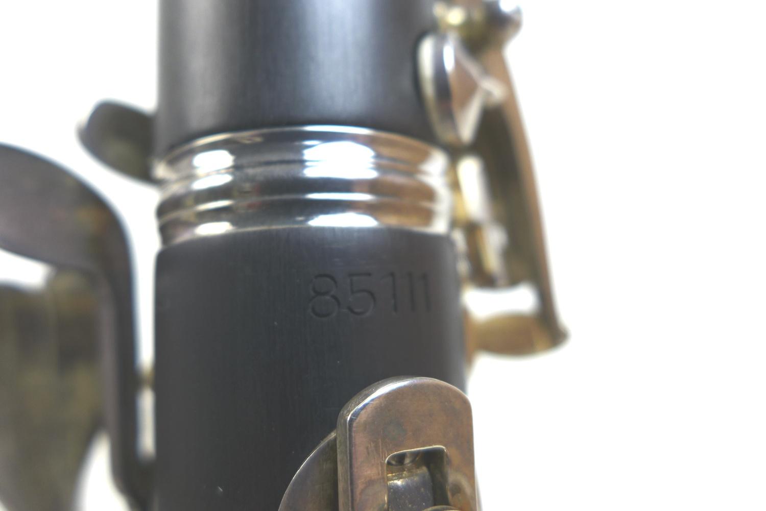 An Arnold & Sons five piece clarinet, 66.5cm long, with spare connecting section, with spare reeds - Image 5 of 7