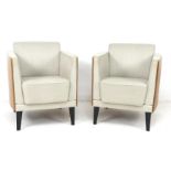 A pair of modern Danish armchairs, by Erik Jorgensen (Jørgensen), Art Deco style with bowed