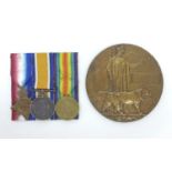 A trio of WWI medals and a Death Plaque for 9664 Private P. C. Bowers, including a 1914 Mons Star, a