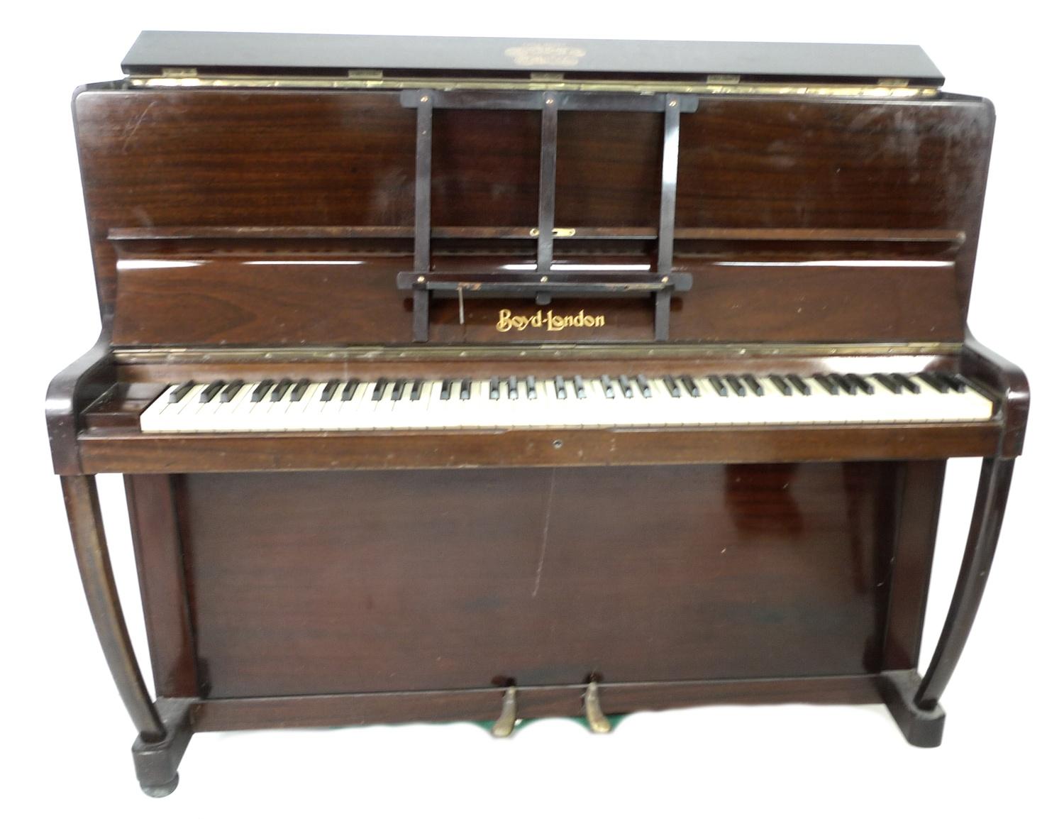 A mid to late 29th century upright piano, by Boyd, London, 133 by 53 by 109cm high.