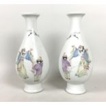 A pair of Chinese early 20th century famille rose porcelain vases, of inverted baluster form with