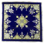 A late 19th century Russian stumpwork altar cloth, the deep blue velvet ground sectioned and