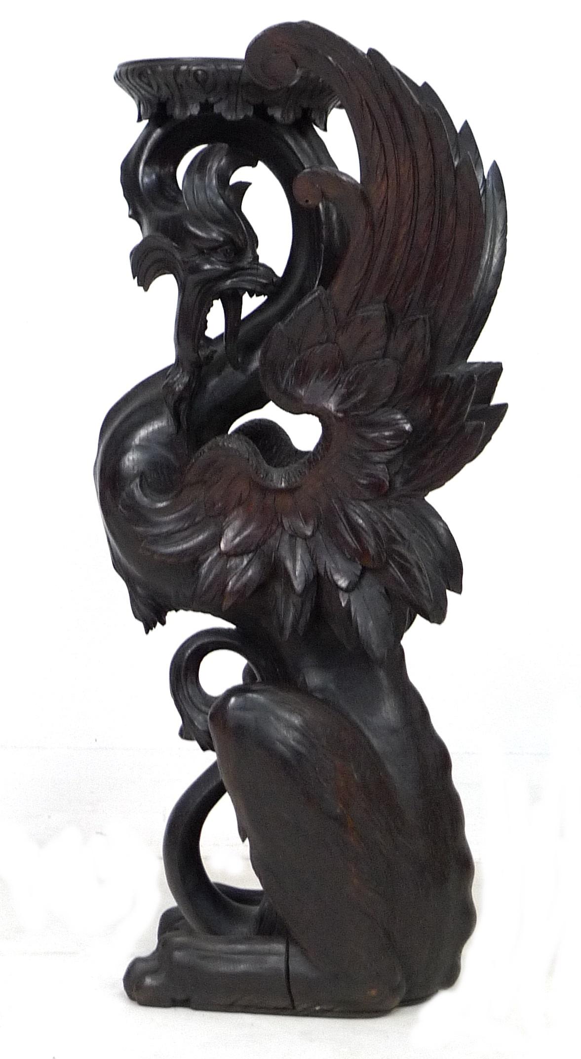 A Continental 19th century finely carved oak Pixiu style form jardiniere stand, with its shaped - Image 2 of 6