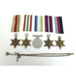 A group of WWII medals, for Petty Officer Perkis Royal Navy, who served on the HMS Suffolk and other