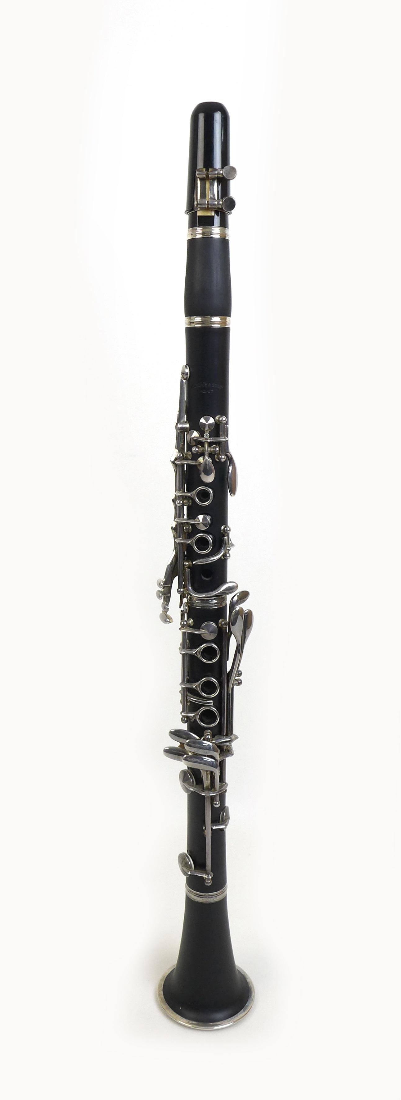 An Arnold & Sons five piece clarinet, 66.5cm long, with spare connecting section, with spare reeds