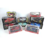 Ten 1/18 and 1/24 scale die cast model cars, comprising seven Burago model cars, including five 1/18