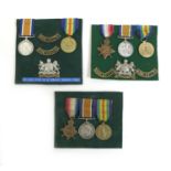 Three groups of WWI medals, a WWI trio of medals named 2460 Pte. E. Burns. Manchester Regiment,