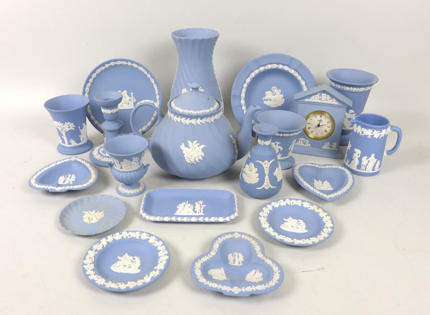 A collection of Wedgwood Jasperware, mostly in blue and white, including a teapot, 15cm high, a