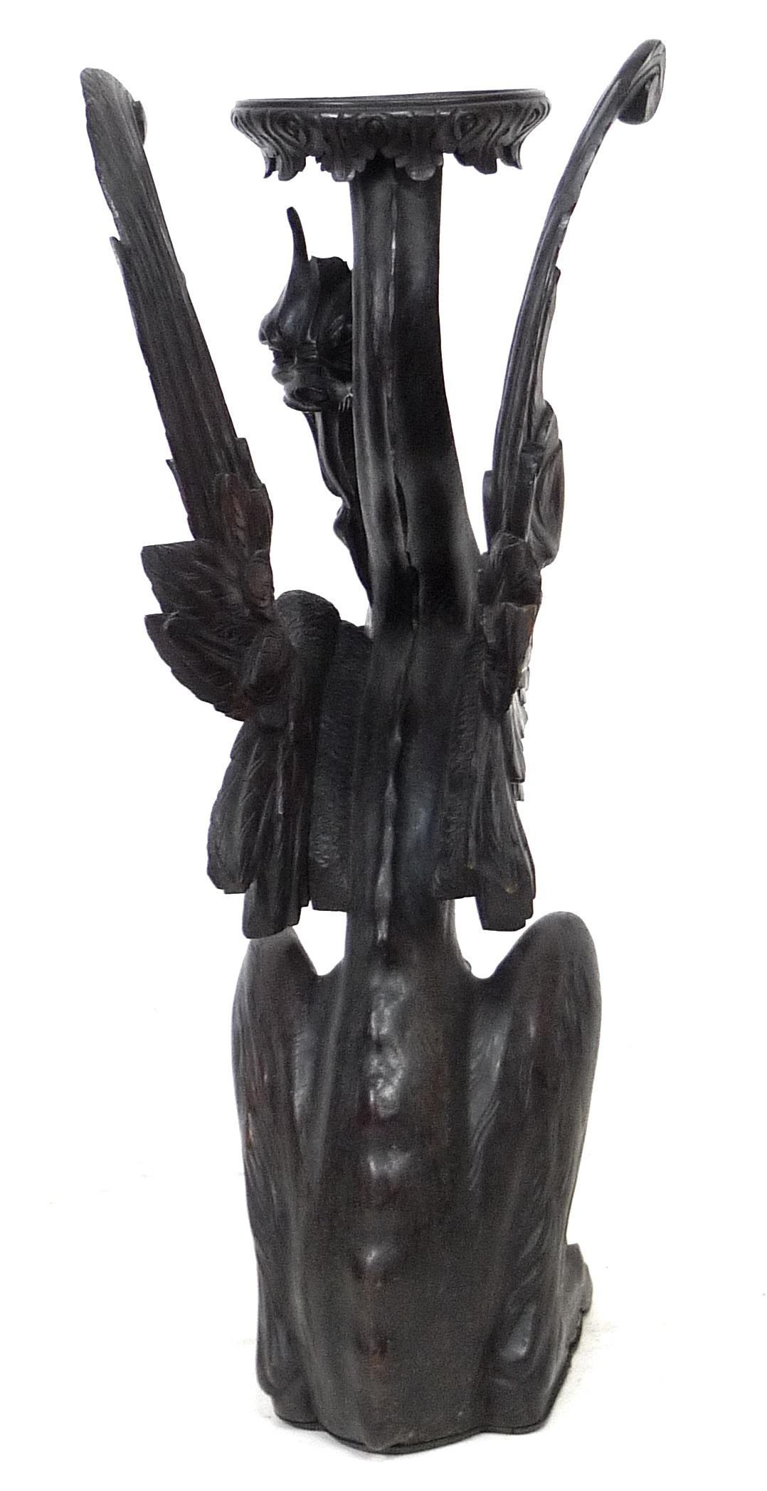 A Continental 19th century finely carved oak Pixiu style form jardiniere stand, with its shaped - Image 3 of 6