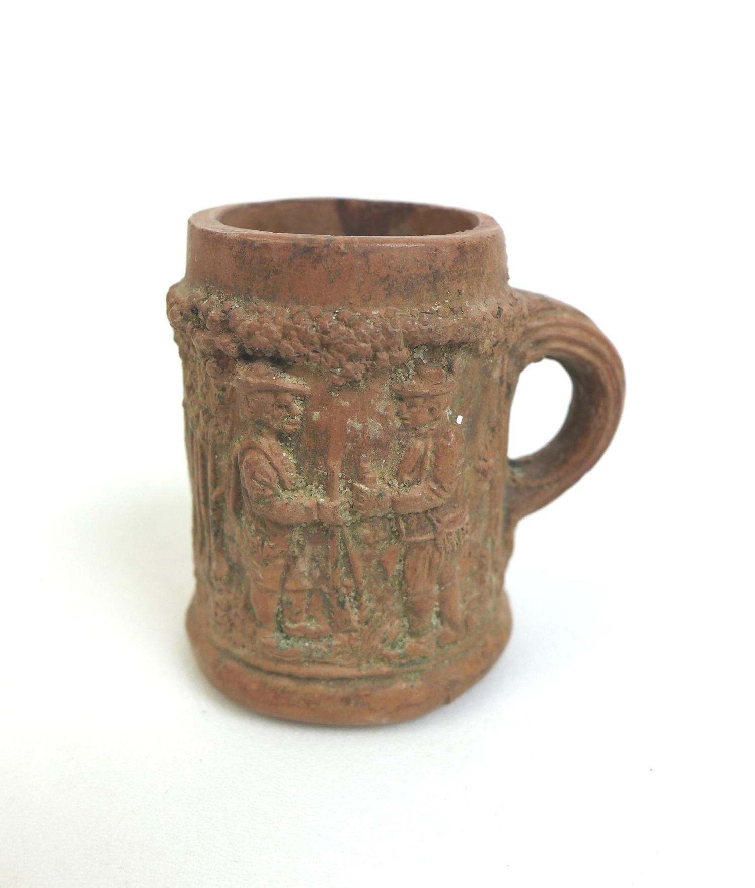 A detectorist found small mid 16th/17th century terracotta tankard, with single handle, with