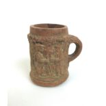 A detectorist found small mid 16th/17th century terracotta tankard, with single handle, with