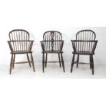 A group of three 18th and 19th century Windsor chairs, each of low back form with shaped seats and H