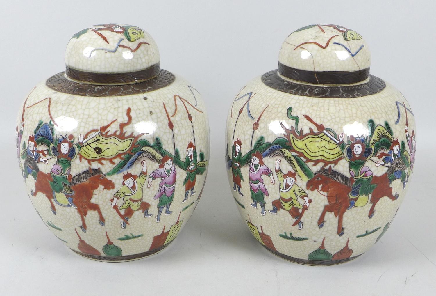 A pair of early 20th century Chinese porcelain ginger jars and covers, decorated as a mirrored pair, - Image 2 of 4