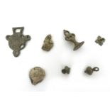 A collection of seven detectorist finds dating from 13th century and later, a 17th century cloth