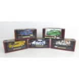 Five Scalextric model racing cars, comprising a Lamborghini Diablo (C127), a Texaco Escort XR3i (
