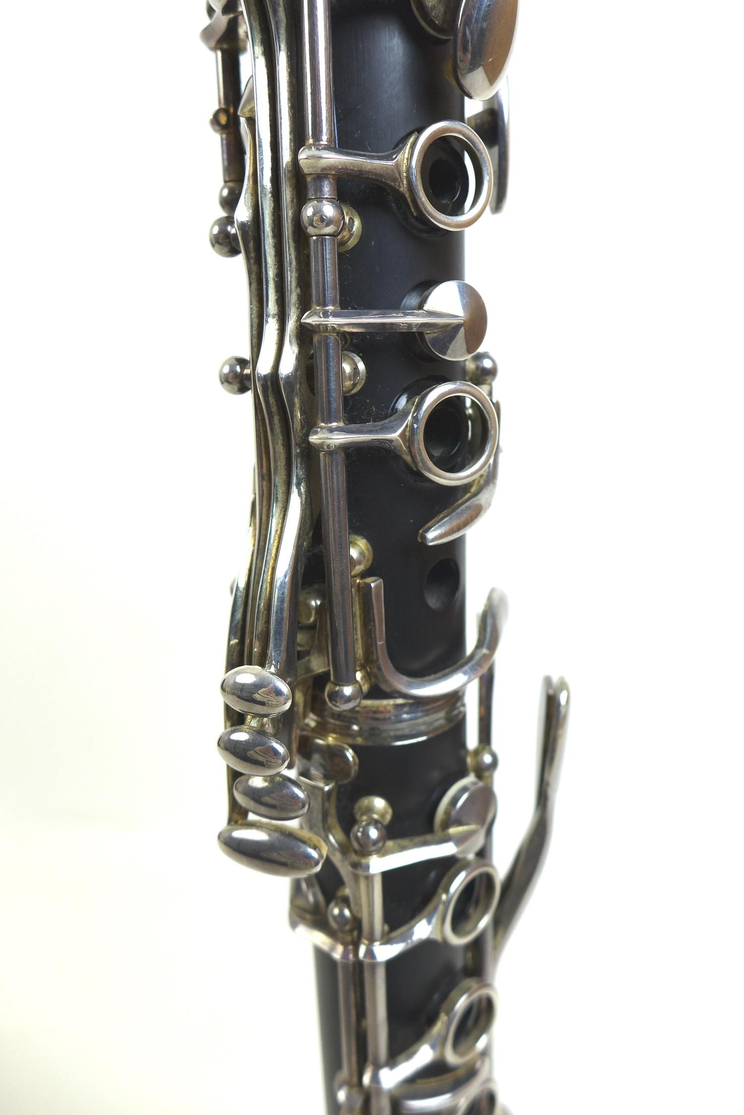 An Arnold & Sons five piece clarinet, 66.5cm long, with spare connecting section, with spare reeds - Image 6 of 7