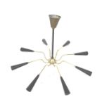 A retro eight branch ceiling light fitting, with brass arms and black cone shaped bulb holders, in
