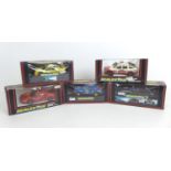 Five Scalextric racing cars, comprising a Ferrari GTO (C391), a Cosworth Texaco (C455), a STP Escort