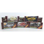 Five Scalextric racing cars three with headlights, A porsche in black (C428), a Ford XR3i in