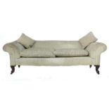 A 19th century Chesterfield style settee, three seater, with scroll over arms and back, the rosewood