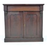 A Victorian rosewood veneered chiffonier, single frieze drawer over double cupboard doors, carved