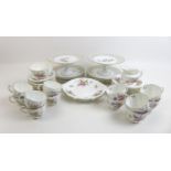 A Royal Crown Derby part tea set in the Derby Posies pattern, comprising twelve tea cups, twelve
