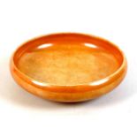 An Art Deco Royal Doulton ceramic bowl, decorated in orange lustre glaze, black printed factory mark