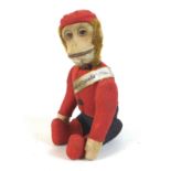 A Schuco articulated model of a monkey, circa 1930, with nodding head swivelling by moving the tail,