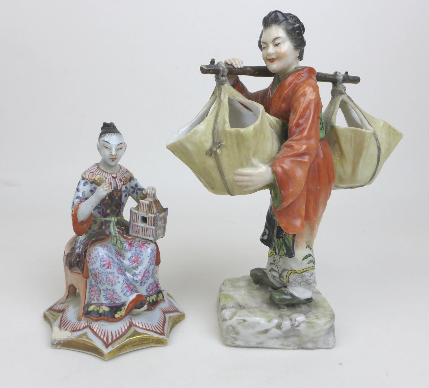 A group of four Oriental figurines, a Hochst style Chinese lady carrying her wares, with cartwheel - Image 5 of 6