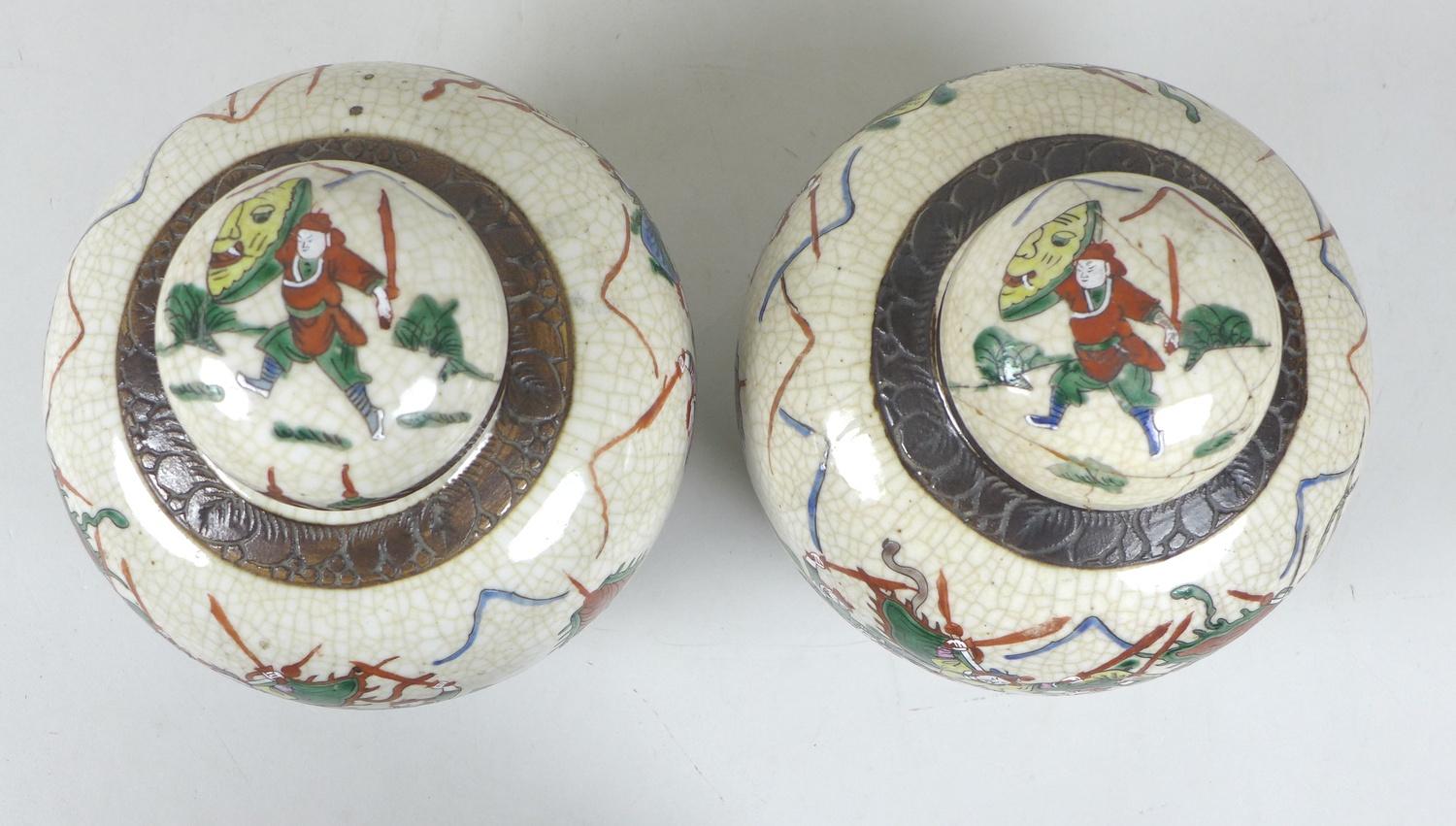 A pair of early 20th century Chinese porcelain ginger jars and covers, decorated as a mirrored pair, - Image 3 of 4