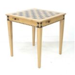 A modern games / card table, flip over inset surface with chess board one one side and fabric to the