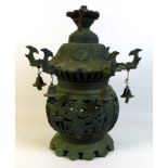 A Chinese bronze lantern, early to mid 20th century, of ovoid bodied form with pagoda style roof,