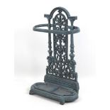 A modern reproduction metal stick stand, in Victorian style, painted in a green weathered style