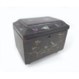 A 19th century chinoiserie tea caddy of sarcophagus form, with mother of pearl inlaid floral and