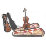 A vintage Mahalo ukulele, together with a French violin, the bridge stamped 'De Jacques', with