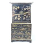 A mid 20th century Chinoiserie press cupboard, in George III style, with black lacquer and gilt