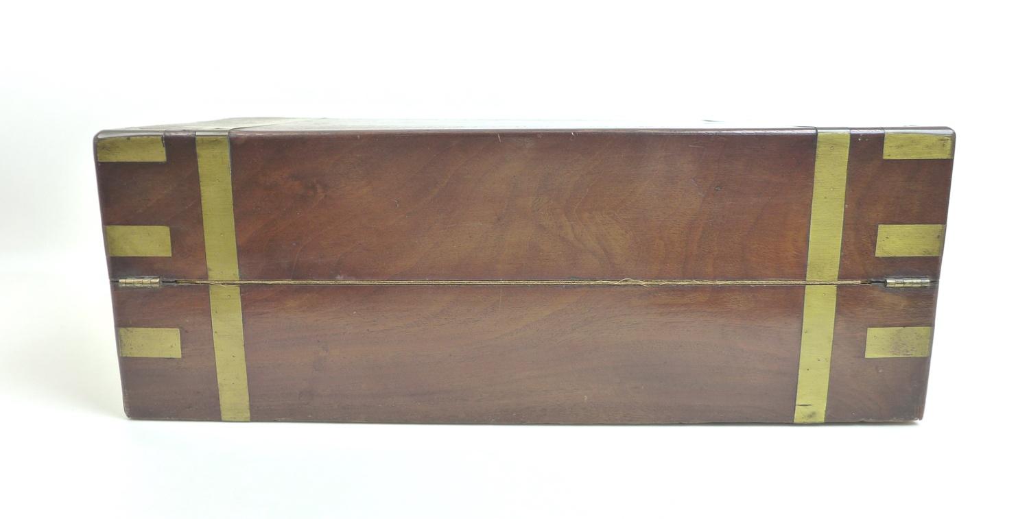 A large Victorian mahogany writing slope, with a secret bank of three drawers, each with hand - Image 11 of 12