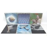 A collection of over 180 vinyl records, including Queen News of the World, Jean Michel Jarre Oxygene